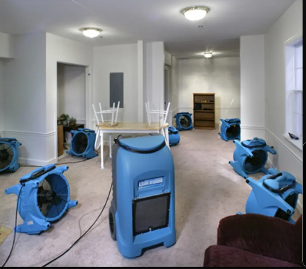 Air movers and dehumidifier setup for Water Extraction & Removal in Boonville